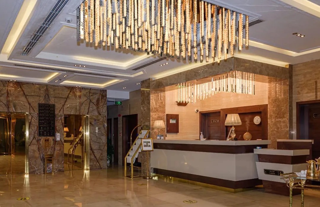 The lobby and reception under a crystal chandelier